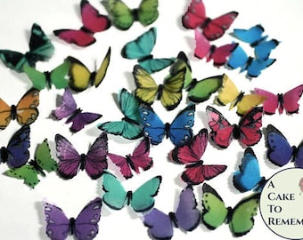 48 small rainbow edible butterflies, additional colors available. 1/2" - 3/4" sized cake or cupcake topper, cake pops or smash cake topper.