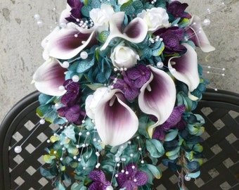 Teal plum cascading bouquet with picasso calla lilies, blue, purple hydrangea bouquet, teardrop bouquet, peacok feathers, pearls