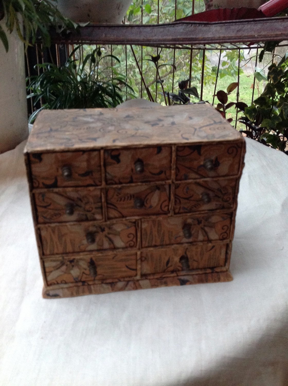 Early wallpaper chest of drawers..faded and worn … Haute