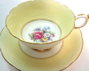 Paragon Tea Cup and Saucer, Yellow tea cup and saucer set, Antique Yellow Paragon tea cup set.