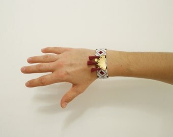 AVA cuff in woven cotton with metal piece and pompons / pastel blue and plum purple