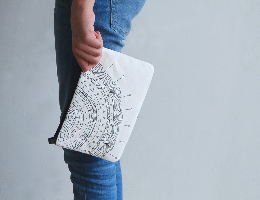 white flower clutch bag