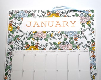 2017 Wall Calendar, sized 11x17 Inches, featuring 12 different full pattern illustrations in coral, blue, yellow, orange, pink and green