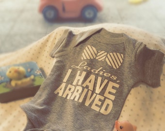 Ladies I Have Arrived Baby Boy Newborn Grey Bodysuit With A White Bow Snap On Buttons Lap Shoulder Fold Baby Shower Gift Idea
