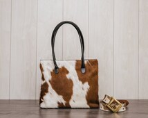fake ysl - Popular items for cowhide clutch on Etsy