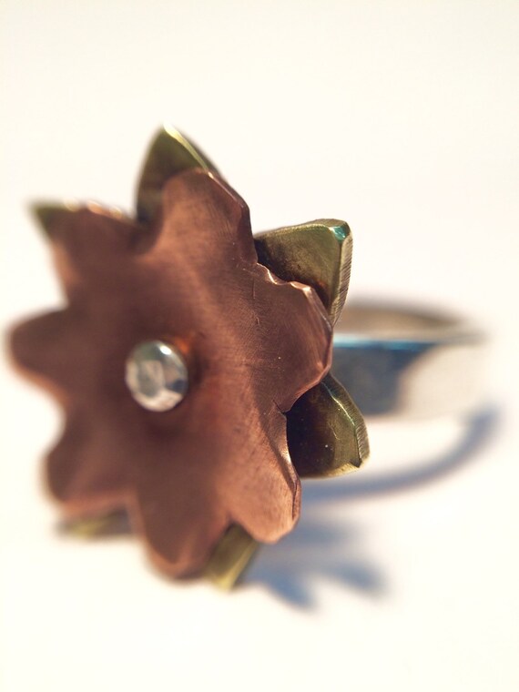 Spinning Flower Ring by MetalsByCris on Etsy