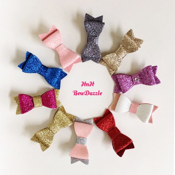 Items similar to Sparkly glitter hair bow, glittery headband bow