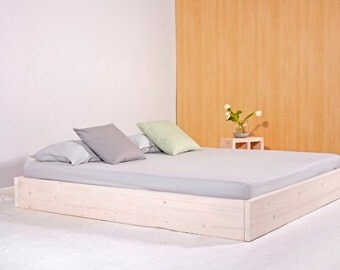 Purist bed from recycled lumber. SIGONSE