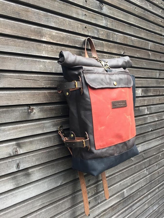 Waxed canvas backpack with detachable leather side straps and
