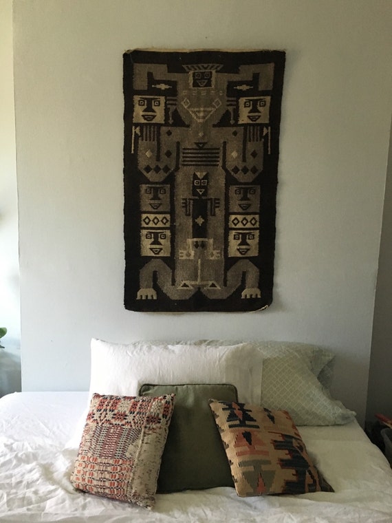 muted mid century peruvian woven wall hanging. bright neon