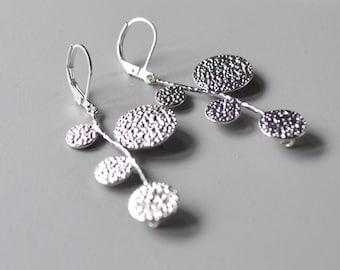 Earrings disk branch