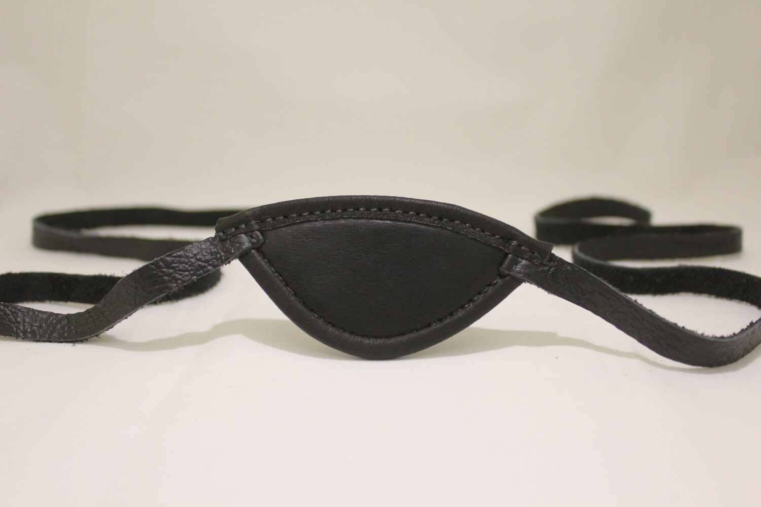 Slim black leather eye patch