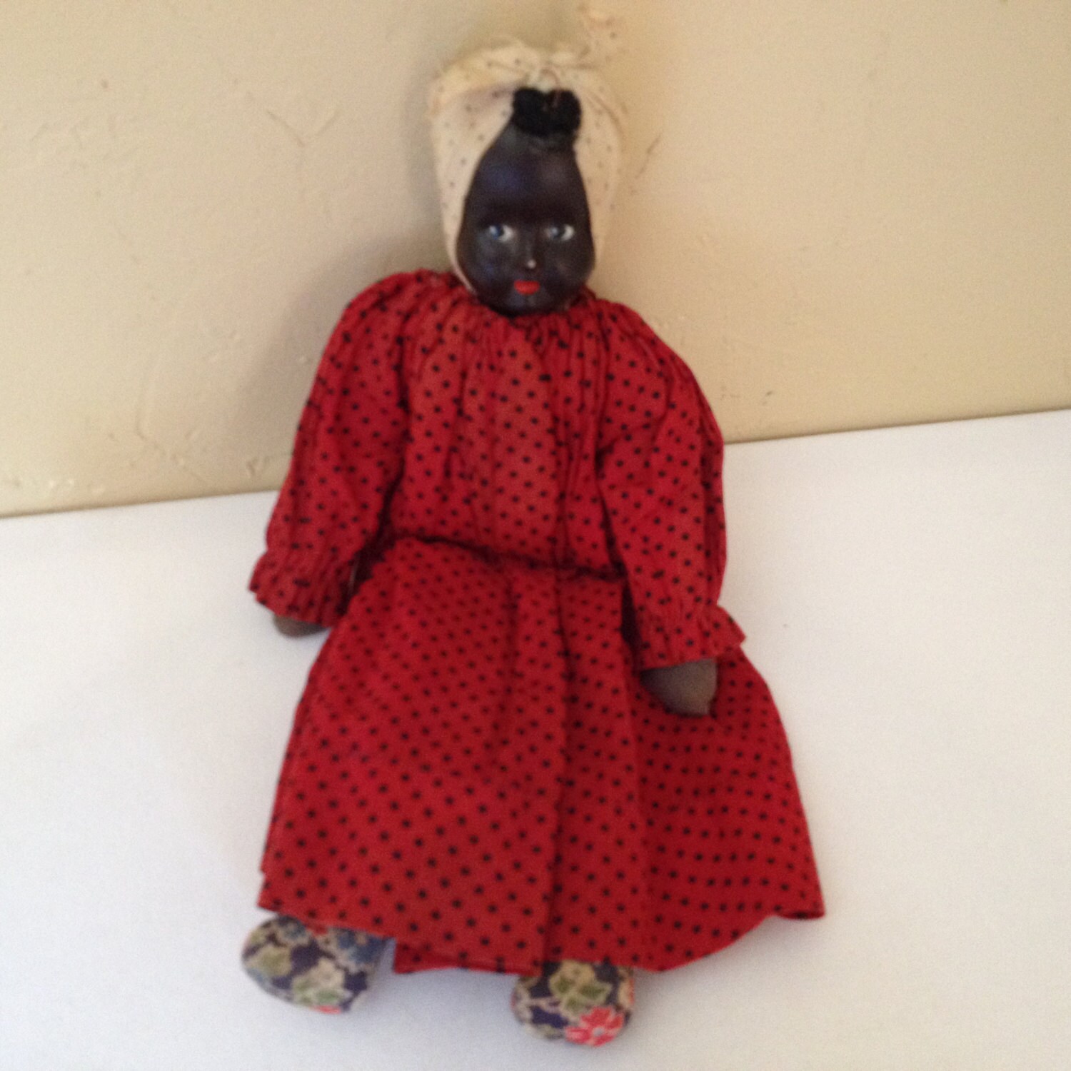 Antique Black Americana Oil Cloth rag doll from the early