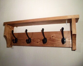 A Handmade Rustic Wooden Coat and Hat Rack Shelf