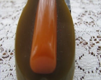 Sale - Two tone greenish/brown and orange bakelite pendant, Vintage