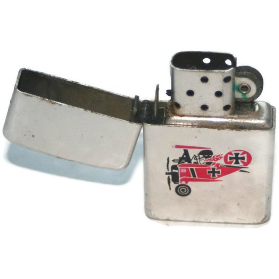 Vintage Storm King Lighter with Red Baron PlaneCollectible