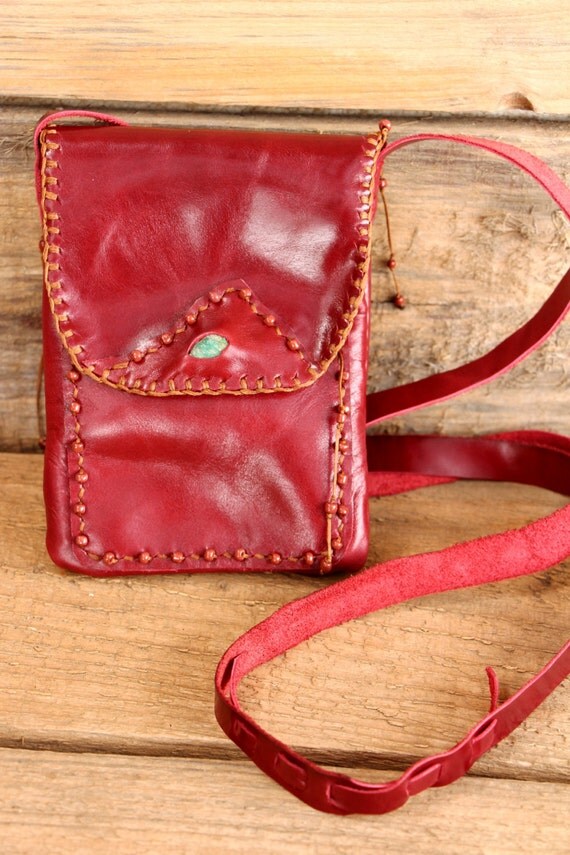 red tooled leather purse