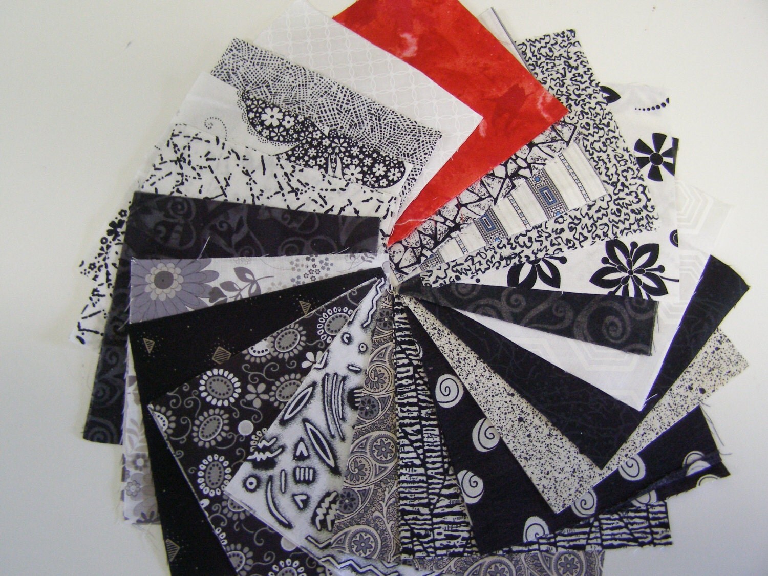 CHARM PACK 84 five inch charm squares 4 of each black