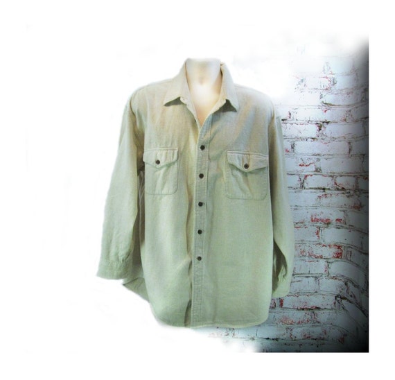 cream color button up shirt