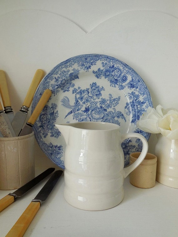 Traditional vintage white banded dairy or milk jug. Melba Ware