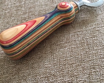 Recycled skateboard bottle opener