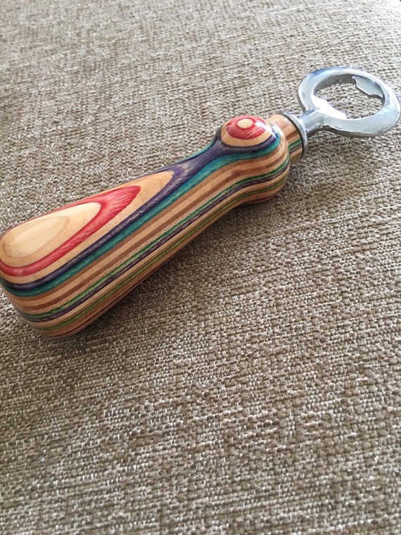 Recycled skateboard bottle opener