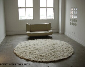 Authentic 8' Round natural white flokati shag rug. 2.5" low profile shag pile. Hand made. 100% wool - no synthetics.
