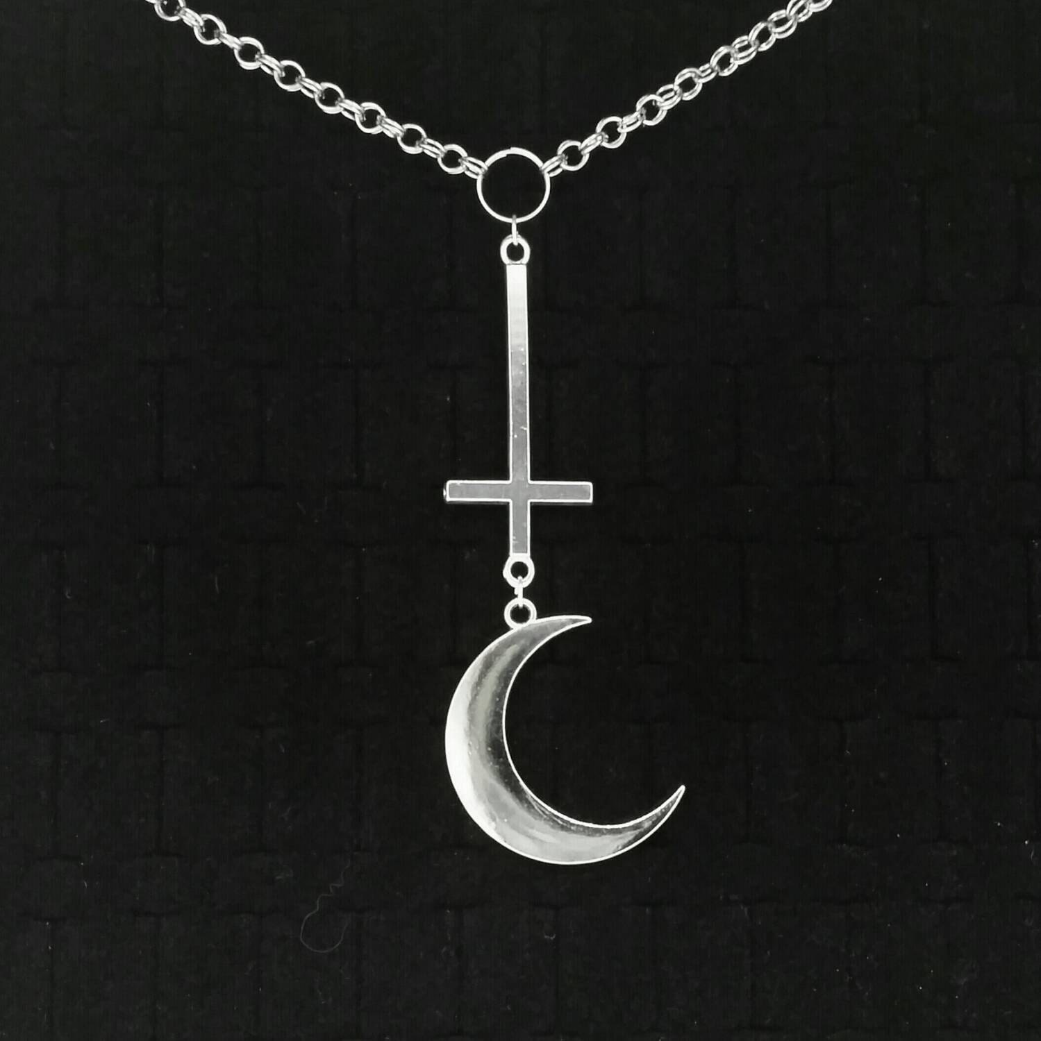 crescent moon with cross symbol astrology