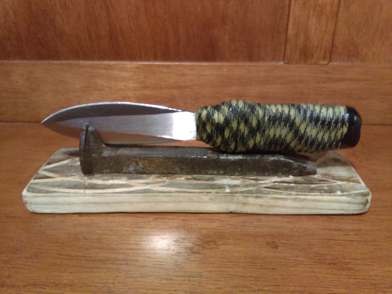50 ParacordWrapped Throwing Knife on Mounted Railroad Spike