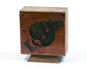 Vintage custom made speaker with hand carved ornamental notes on the front. Not working. Probably French made. One of a kind object!