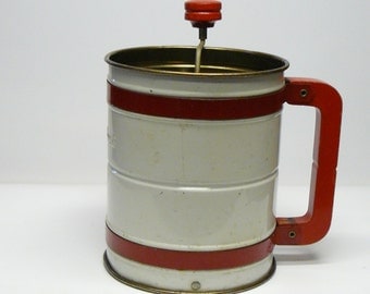vintage red handle androck flour sifter with wood handle