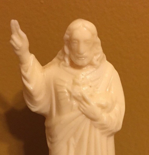 small plastic jesus figurines