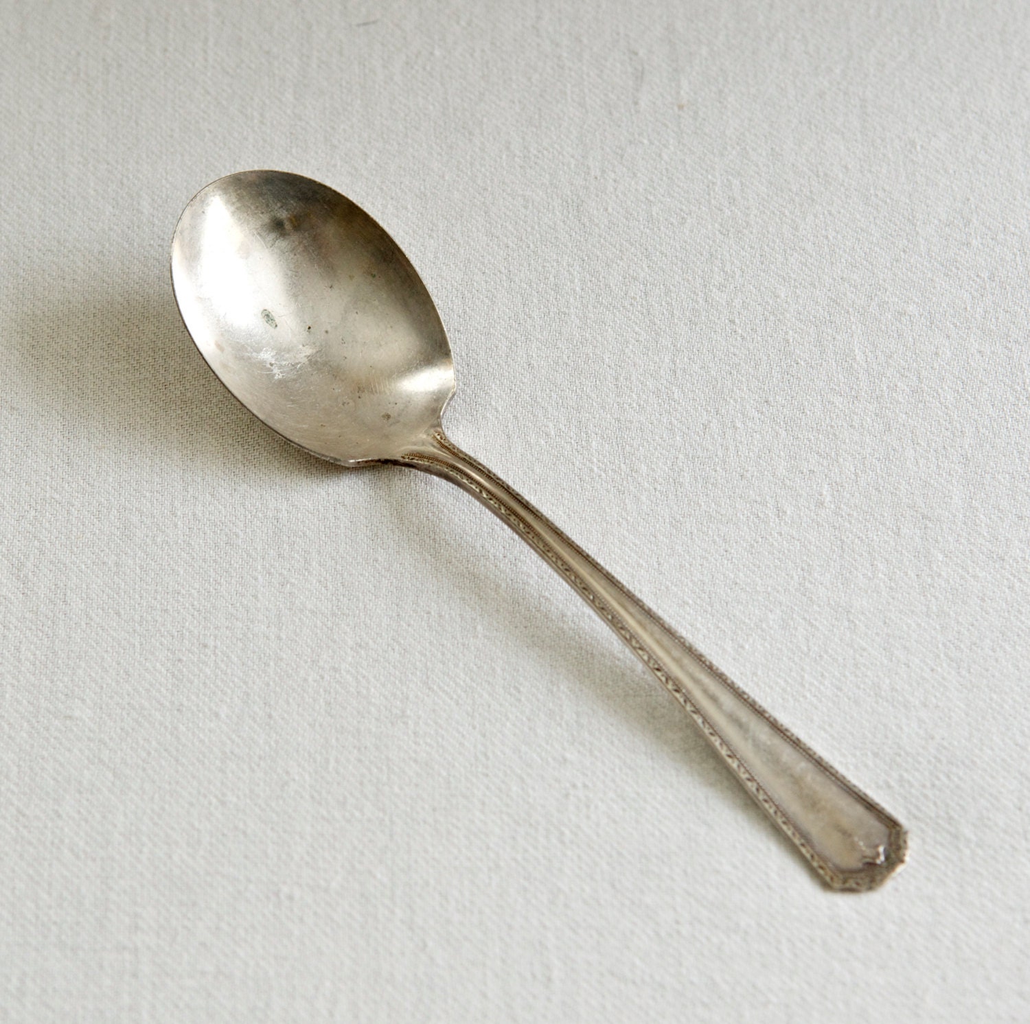 Vintage silver plate sugar spoon...Simeon L. & H.