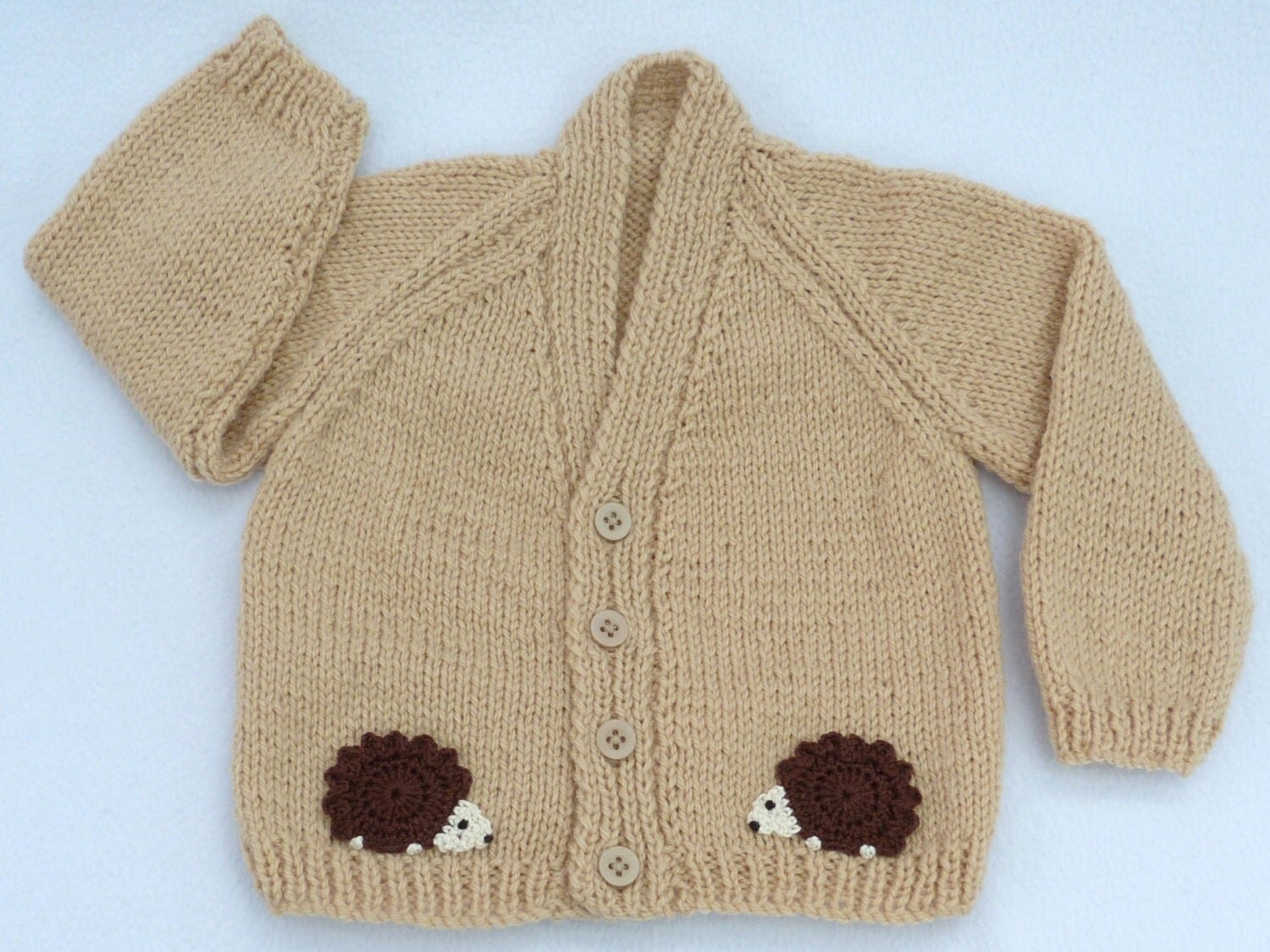 Baby hand knitted beige baby cardigan to fit 3 to 6 months