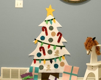 Deluxe White Christmas Felt Tree - Wall Activity. Includes hanging strips. Buy a craft, feed a baby.