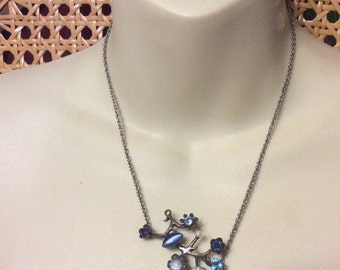 Up cycled made by me necklace and an old earring.