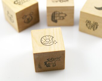 Montessori language materials, story starters, story stones, language learning, wooden cubes, writing prompts, preschool learning toy
