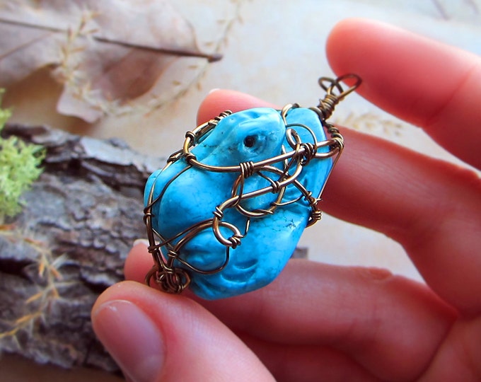 Totem or spirit animal necklace "Amazon Rainforest" with wire wrapped carved turquoise howlite frog figurine. Custom length chain.