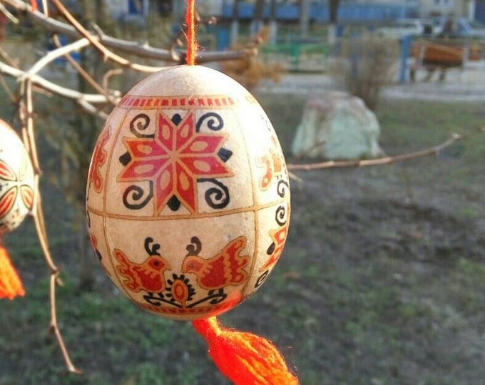 Traditional Ukrainian Pysanka - an Easter egg on brown eggshell