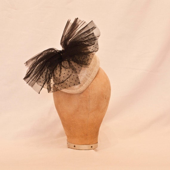 Handmade ivory heart shaped hat/fascinator with black tulle bow