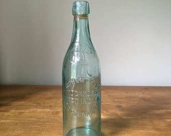 Vintage pre-prohibition blue glass beer bottle from Rockford Brewing company 1900-1920 era