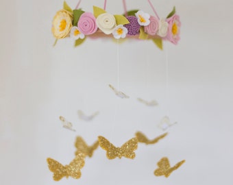 Butterflies and spring flowers baby mobile in muted pastels; dusty pink, lavender and palest yellow with gold butterflies. Vintage style.