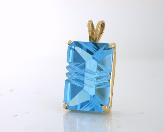 Blue Topaz Faceted and Carved Gemstone Pendant 14k