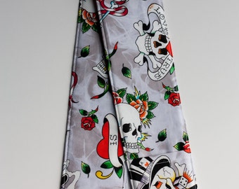 Camera Strap Cover - includes padding and lens cap pocket - Ed Hardy