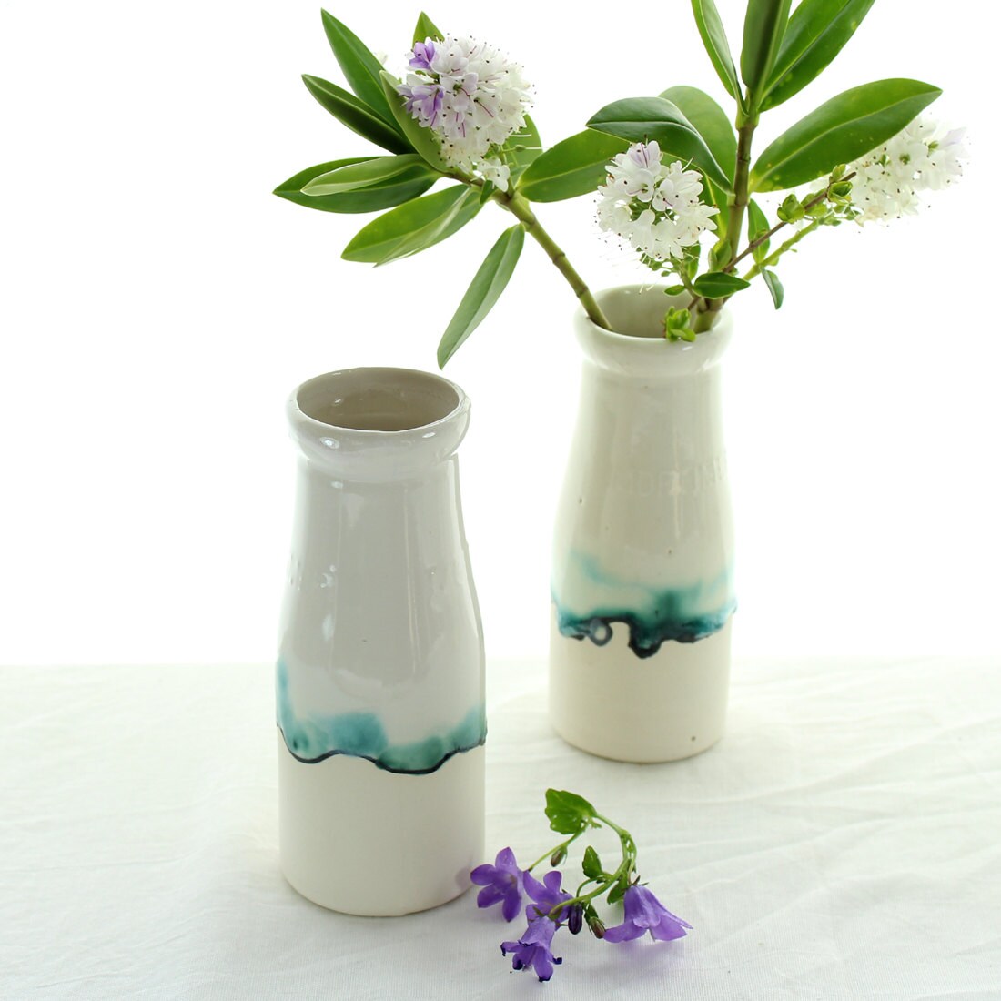 Interior room decor. Ceramic vase milk bottle bud vase with