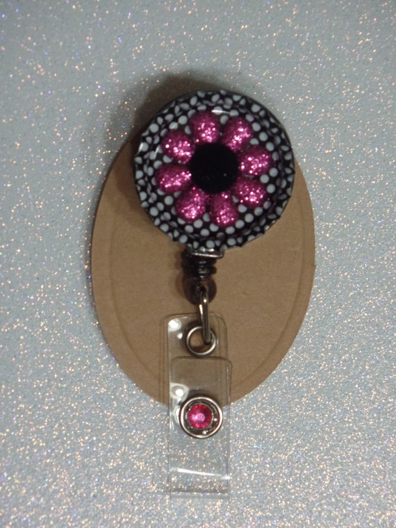 Flower bottle cap badge reel by TheStitchedButton on Etsy