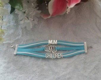 Woven friendship bracelet with charms