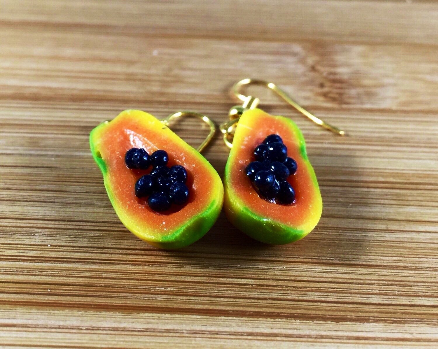 Polymer clay papaya earrings or key ring by URTnRACKYs on Etsy