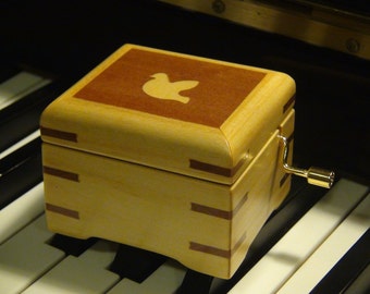 Wooden music box - Hand Crafted featuring Dove marquetry work with 18 notes hand crank music box play selected song
