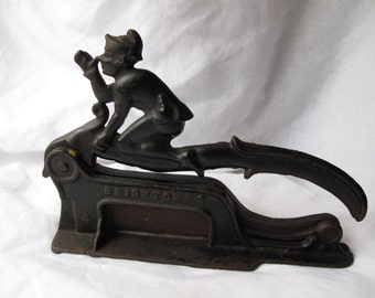 Cast Iron Nose Thumbing Elf Plug Cutter